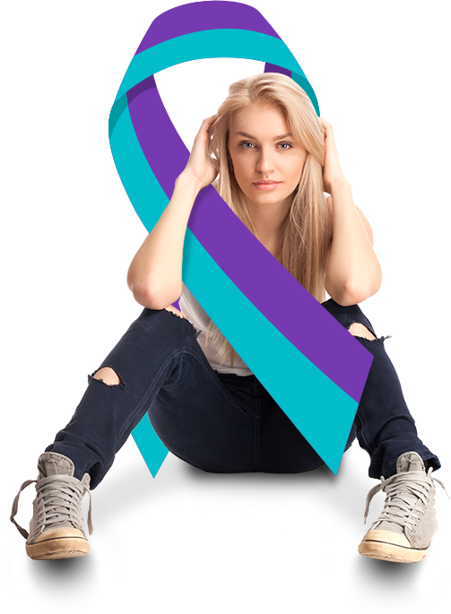 Teenage girl sitting on the ground with suicide prevention ribbon.